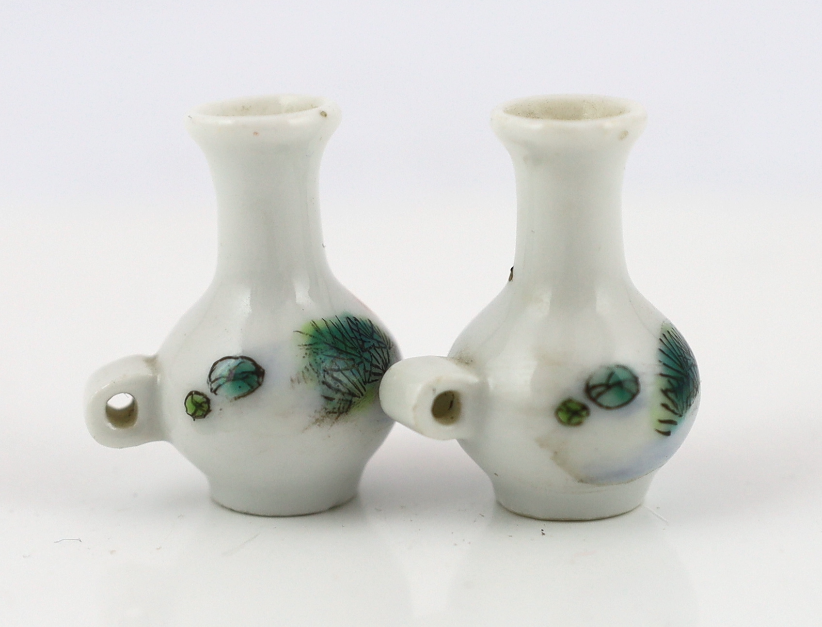 A pair of Chinese enamelled porcelain ‘goldfish’ bird feeders, Guangxu period
